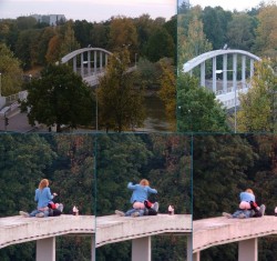 Couple having fun on top of bridge