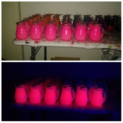 Another batch of Pitcher Candles - black light reactive hot pink.