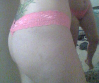 Lacy pink and sheer thong showing off my ass