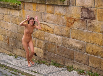 Naked girl acting silly in public