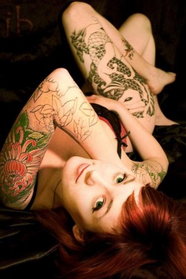 Redhead with tattoos