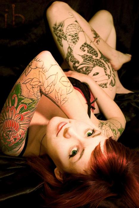Redhead with tattoos