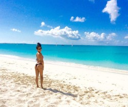 Round asses Asian beauty at the beach