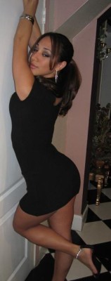 Tight Little Black Dress Against The Wall