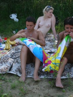A couple of women stray within the pack plus swim inside the ocean when being totally nude