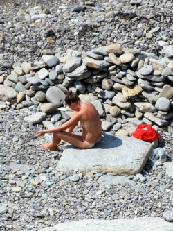 Totally bare people having fun inside the sun