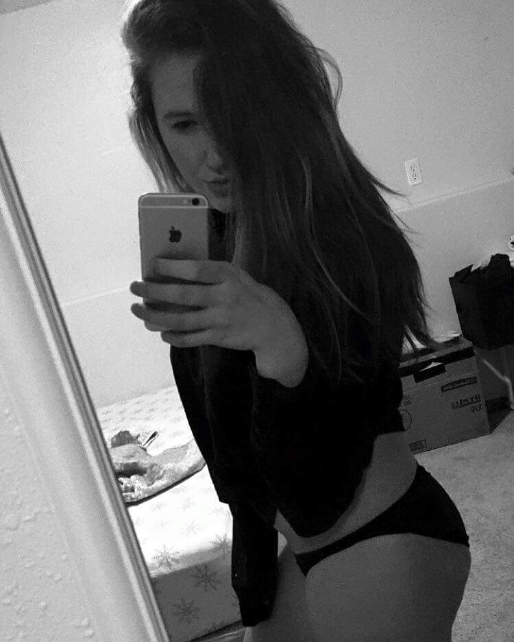 Ass in black in white