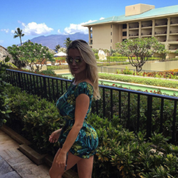 Lindsey Pelas blending in with the Shrubbery