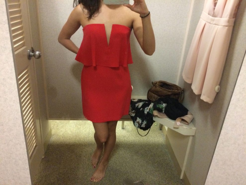 Trying on a red dress