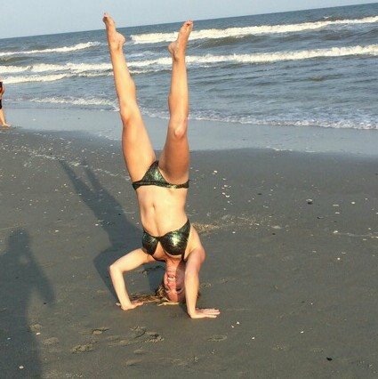 Sexy bikini handstand