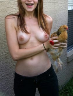 Two chix showing their breasts.