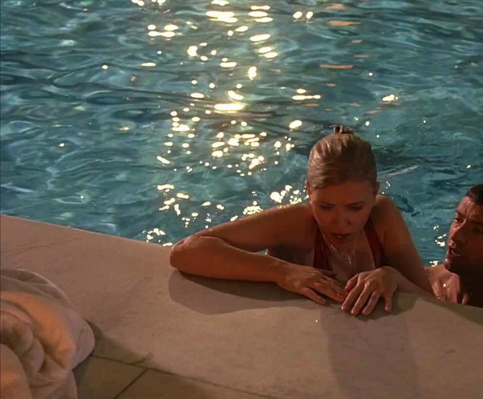 Nice view of Scarlett Johansson's plots as she climbs out of a pool in Scoop