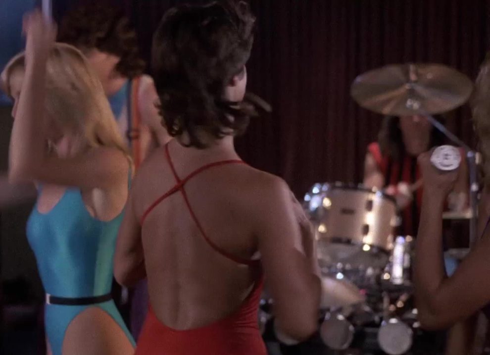 Dee Anderson shaking her plots in Hardbodies (1984)