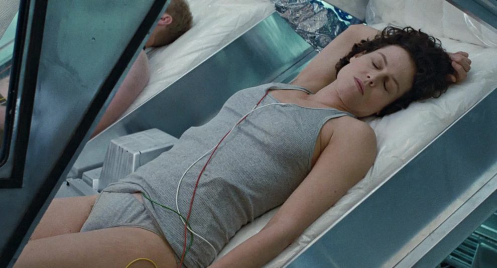 Sigourney Weaver's hairy 70's bush peaks out the right side of her panties in Alien