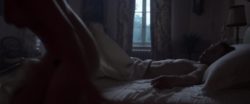 Lily James leaves a bed