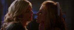 Bella Thorne and Samara Weaving french kiss in The Babysitter