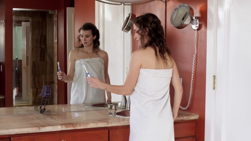 Melissa Johnson enjoys her toothbrush in "Barely Legal" (2011