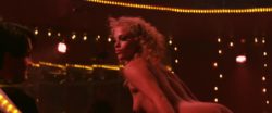 Elizabeth Berkley keeps the plot moving in "Showgirls"