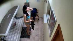 Superior Brunette Tanning Completely Shaved Pussy